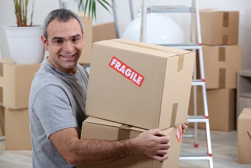 Professional removals team planning a move in Lewisham street