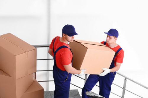 Office relocation planning in Lewisham with business equipment and moving boxes