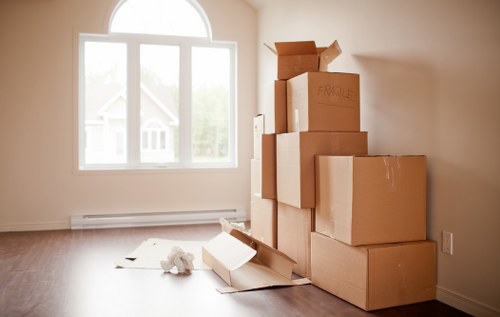 Furniture and boxes being loaded into a van for a Lewisham move