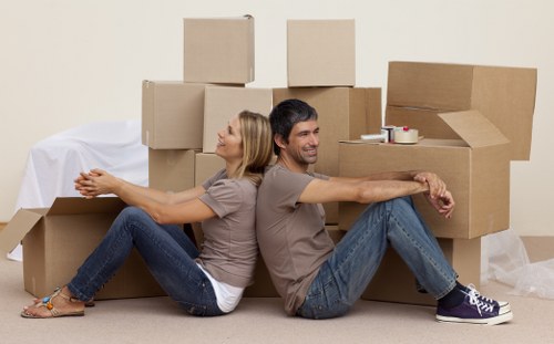 Securely stacked furniture and equipment inside a moving van
