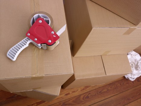 Trained movers handling furniture carefully in a local relocation
