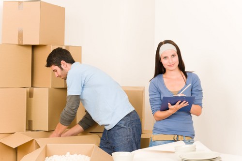 Careful furniture moving inside a Lewisham home
