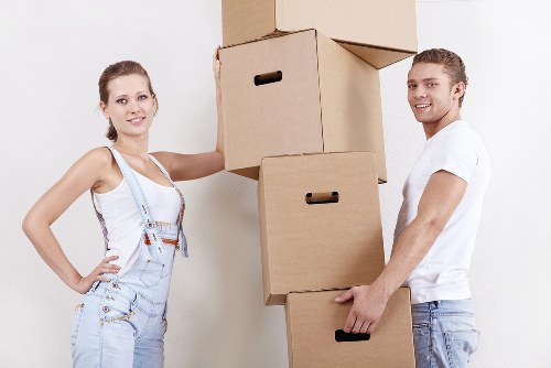 Packed moving boxes and furniture ready for a Lewisham home move