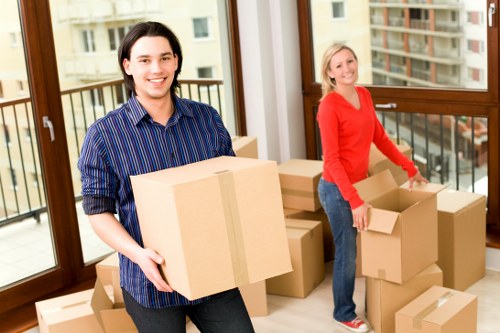 Packed office boxes and furniture ready for relocation